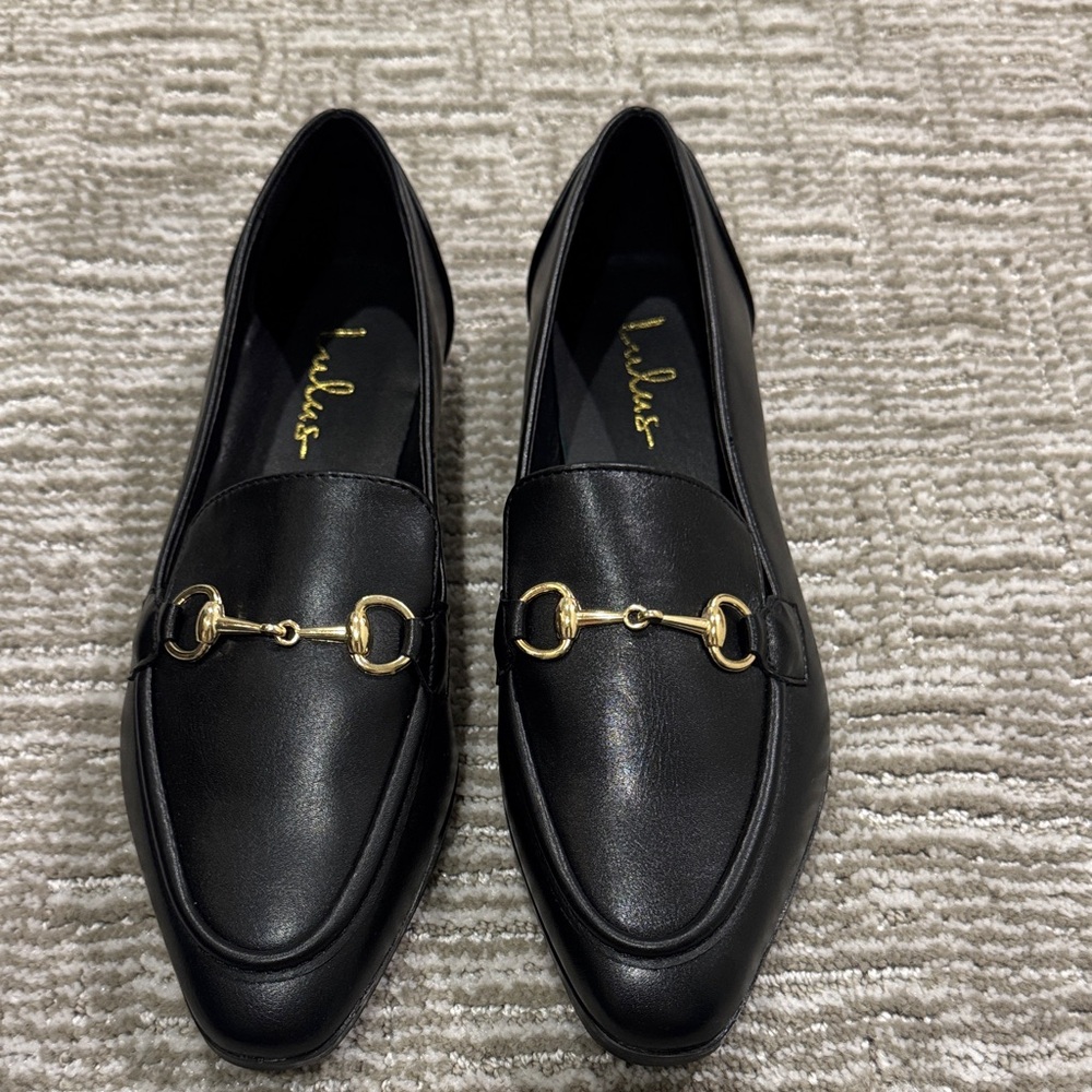 Black Loafers with Gold Detailing